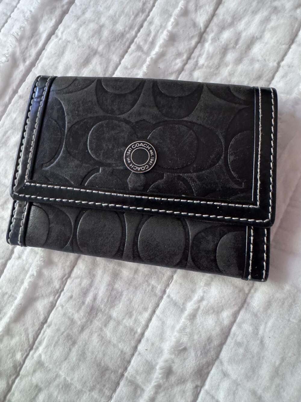Coach Signature Embossed Leather Trifold Wallet
